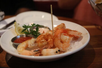 Dinner placed on the table at an upscale restaurant in Columbus, Ohio