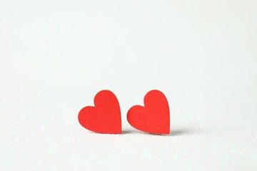 Red decorative hearts on white background, space for text. Happy Valentine's day