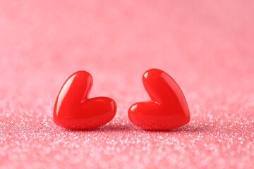 Red decorative hearts on shiny pink background. Happy Valentine's day