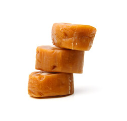Caramel candies isolated on white background
