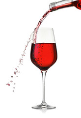 Pouring wine into glass on white background