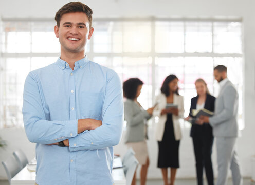 Man, arms crossed and finance intern in office, proud professional and working in accounting. Male person, portrait and confidence for stock exchange, business mission and career in development