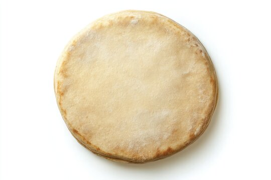 A single round uncooked pizza base ready for toppings