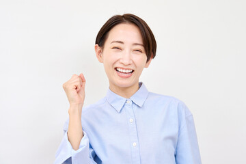 女性　ガッツポーズ　白背景