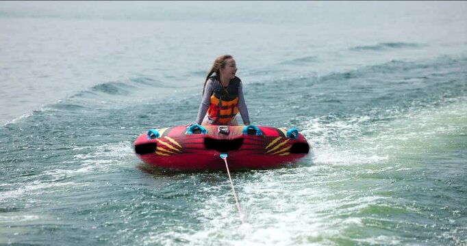 Slow Motion Child Boat Tubing