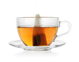 Cup with teabag isolated on white. Brewing aromatic tea