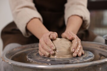 Hobby and craft. Woman making pottery indoors, closeup