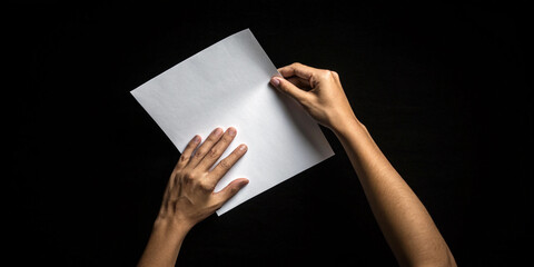 Hands Grasping a Sheet of White Paper Isolated on a White Background, Indicating Preparedness for Communication