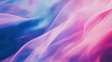 Fototapeta premium Soft waves of pink and blue light flow smoothly, creating a fluid, serene motion that is both peaceful and dynamic.