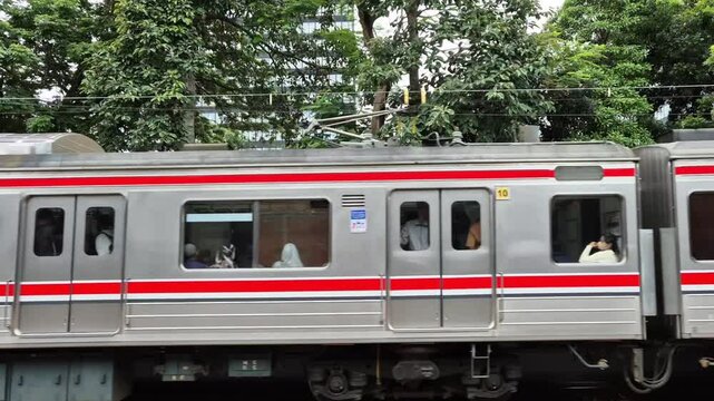 Jakarta, Indonesia - January 30 2025:  Jakarta Commuterline train car or commonly called KRL, the train is running