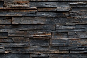 Dark brown wooden wall background with decorative wooden elements, in a rustic and natural style. Wooden panel texture for interior design or decoration in a home or office.