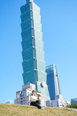 woman traveler visiting in Taiwan, happy Tourist sightseeing in Si Si Nan Cun or Old Military...