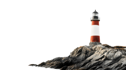 Red and white lighthouse standing on rocky coast with transparent background