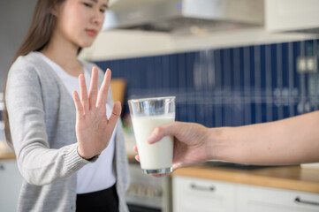 Allergy dairy food lactose intolerance allergen health care illness concept. Selective focus on a...