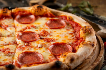 Close-up of a delicious pepperoni pizza with melted cheese.