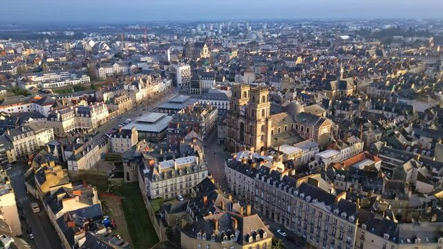 Cath&eacute;drale St Pierre, barges on Canal Saint Martin, Quai St Cyr, square and market of Lices, rennes cityscape, France. Aerial drone sideways and cityscape