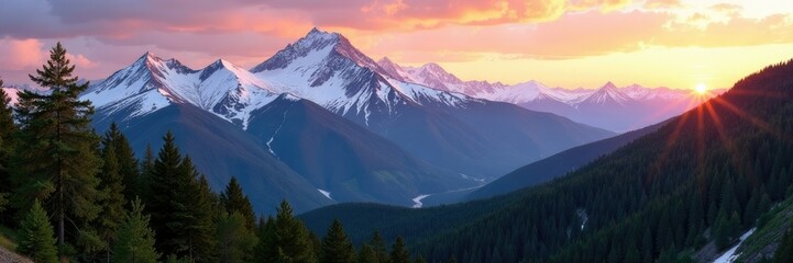 Snow-capped peaks of Monarch Pass in warm sunset light, evergreen forest,