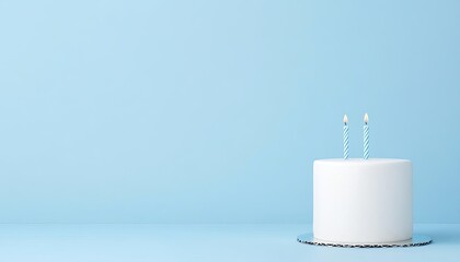 Simple white birthday cake with two candles on a blue background, celebrating a special occasion