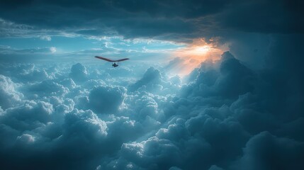 Fototapeta premium Hang Glider Soaring Above a Sea of Clouds at Sunset