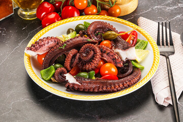 Salad with octopus tentacle and vegetables