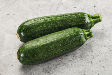 Raw green ripe zucchini vegetable