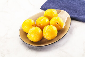 Ripe sweet and juicy Yellow Plums