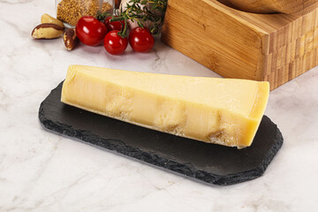 Hard parmesan cheese piece triangle