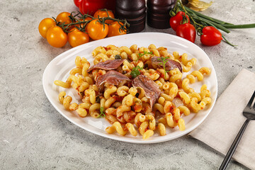 Italian pasta cellentani with anchovy