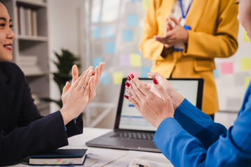 Clap your hands, Female business leaders come together in conference room for their annual meeting,...