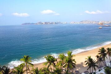 Beautiful aerial view of Acapulco Bay with sand beach, turquoise water and palm trees, Acapulco,...