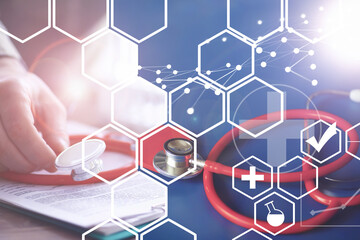 Stethoscope, puzzle heart, prescriptions. Double exposure in composition. Doctor`s desk in the clinic's office.