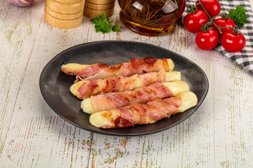 Hot mozzarella sticks with bacon