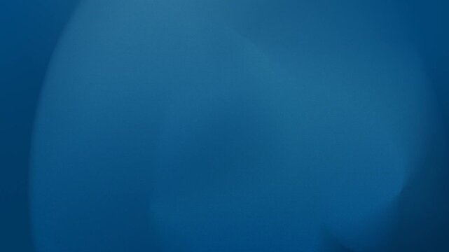 Abstract seamless loop background in soft blue hues, 4K resolution, with smooth gradient transitions and subtle curves forming gentle waves.