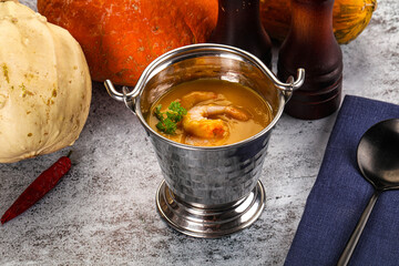 Pumpkin cream soup with prawns
