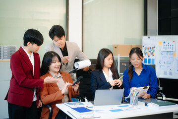  Young business creative team are brainstorming planning discussing while sitting in creative business discussing work