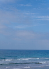 Blue Ocean Waves and Sky