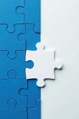 Obraz premium Connecting Blue and White Puzzle Pieces A Symbol of Collaboration and Problem-Solving