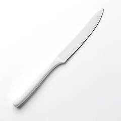 Obraz premium Sharp White Plastic Knife on Firm White Surface