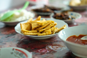 Fried tofu in a plate. Indonesian food