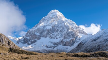Majestic snow-capped peak, valley landscape, sunny day, hiking background