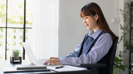 Asian woman working at home. Work from home concept