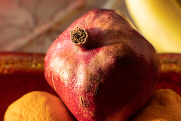 closeup pomegranates fruit on dish