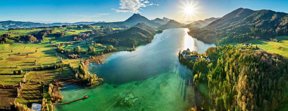 Panaromic view of Fuschl Lake under blue sky at sunny day