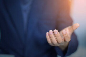 Business Professional Offering Open Hand Gesture for Cooperation and Support, business concept