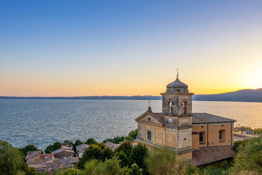 Church Assumption of Virgin Mary near Lake Bracciano at sunset