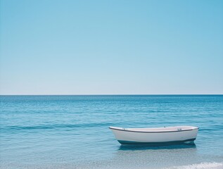 Naklejka premium Small boat floating on calm water.
