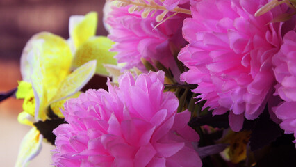 Artificial flower bouquets displayed in a handicraft shop