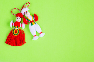 Bulgarian Martenitsa spring sign on green