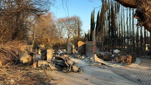 Closeup of Eaton wildfire in the aftermath of complete destruction of a burned down home, 2025 Altadena fires