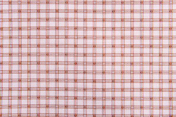 red checkered cotton fabric on white background close up
